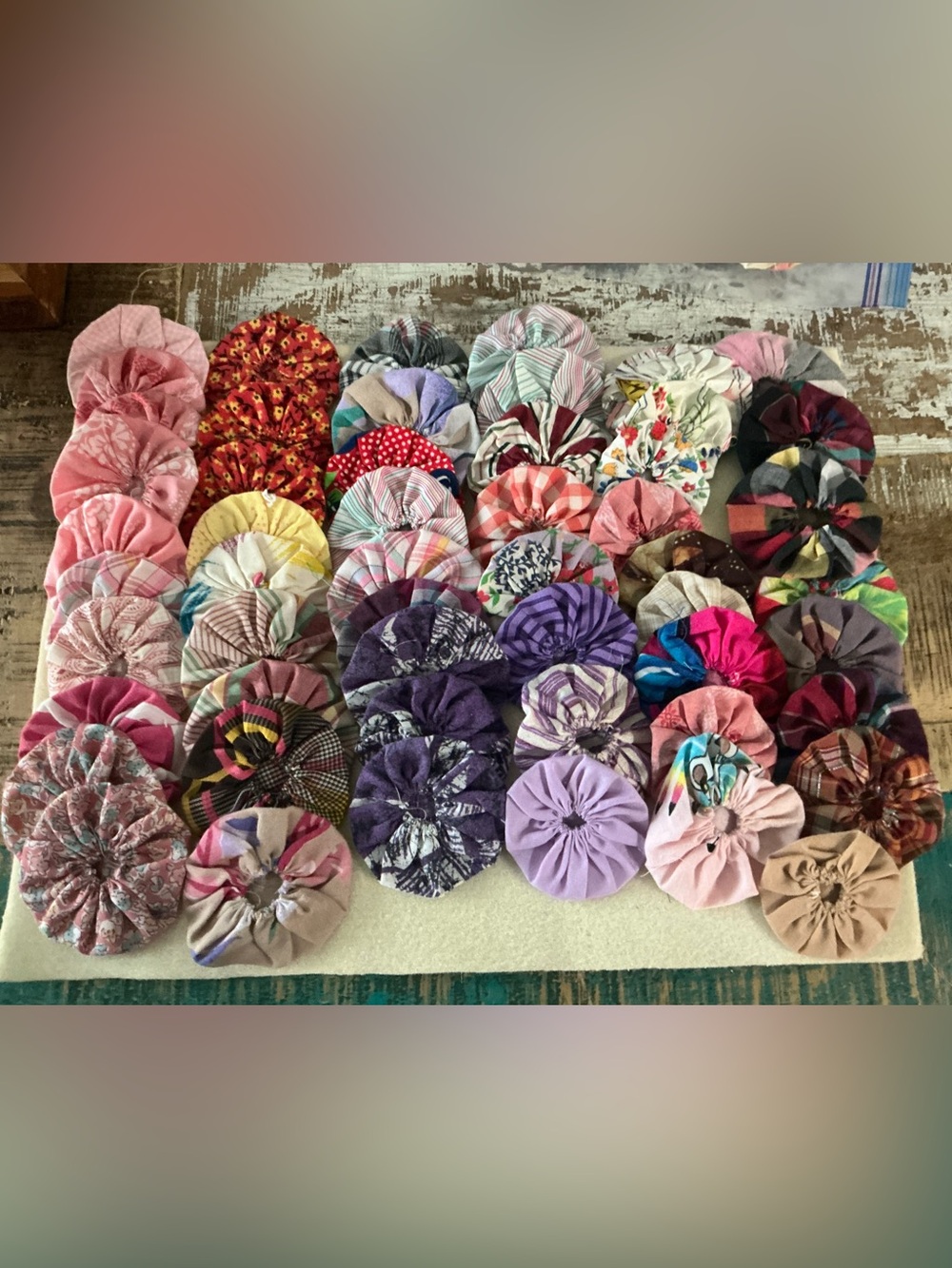 Handmade vintage Fabric Yo-Yo Quilt Pieces, total of 50!